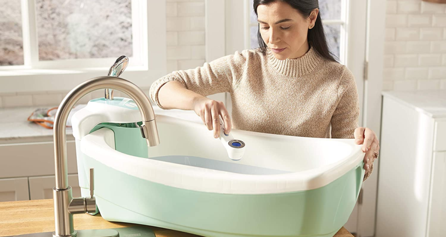 Make sure the bath water temperature is safe for the baby with the Braun No touch + forehead thermometer
